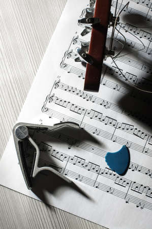 Guitar and accessories with hard shadowsの写真素材