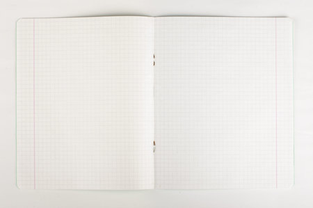 Open blank vintage exercise book isolated