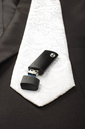 Flash drive on business man clothes