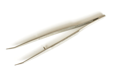 Tweezers isolated on the white background