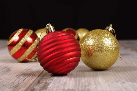 Christmas tree baubles on the reclaimed wood backgroundの写真素材