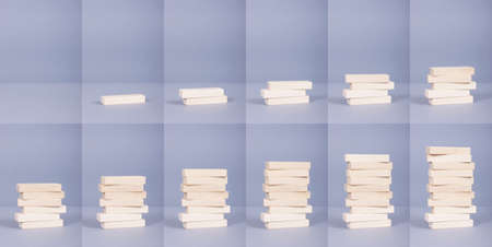 Wooden blocks stack building progress stage conceptの写真素材