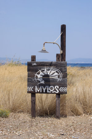 KOS ISLAND, GREECE - JULY 17, 2016: Mylos beach bar sign in Lambi beach, Kos island, Greece