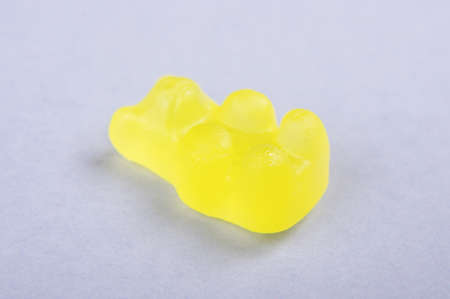 Yellow gummy bear macro close upの写真素材