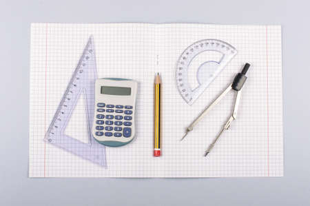 School accessories isolated on the gray backgroundの写真素材