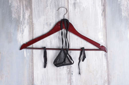 Sexy female g-strings on the hanger isolatedの写真素材
