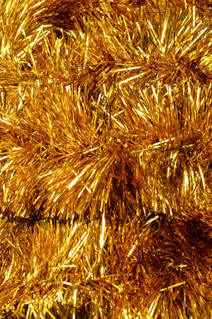 Golden tinsel christmas decorationの写真素材