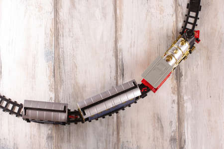 Toy train on the reclaimed wood floorの写真素材