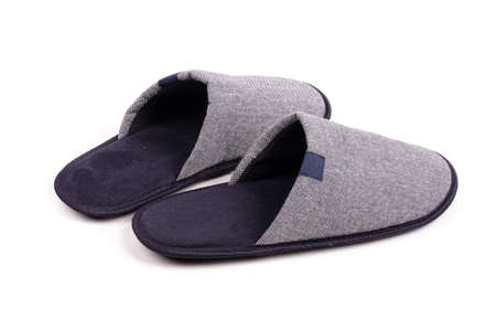 Warm gray slippers isolated on the white backgroundの写真素材