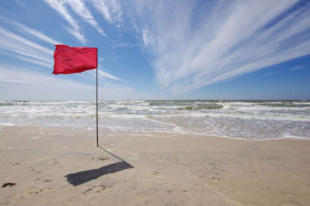 Red flag in the beach bathing prohibitionの写真素材