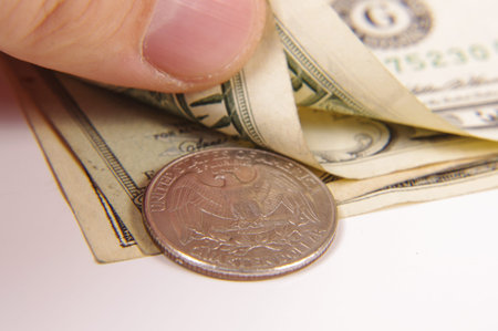 Male hand counting dollars