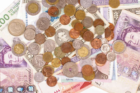 Variety of coins and banknotesの写真素材