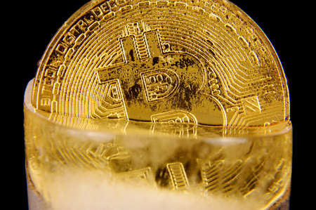 Bitcoin is a virtual currency, but this coin is a symbol of Bitcoinの写真素材