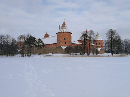 Snowed Trakai island castle winter time in Trakai town, Lithuania
