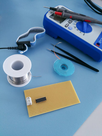 Desktop view of elektronics design and development workshop with various tools