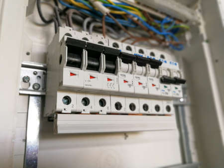Electric safety switches and wiring inside electrical panelの写真素材