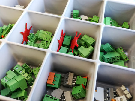 Many electronic components electrical connectors in the trayの写真素材