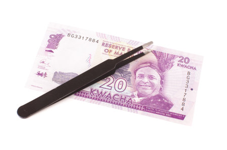 Banknote and antistatic ESD tweezers isolated on the white background