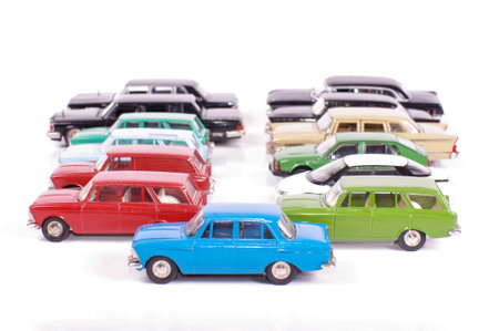 Collection of vintage metal die-cast car models isolated on the white background
