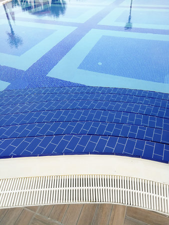 Close up details of luxury outdoor swimming pool. Holidays concept