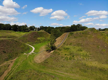 Aerial view of historical Kernave town with green mounds in Lithuania during summerの写真素材