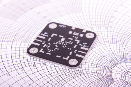 Black unassembled radio frequency printed circuit board PCB on the Smith chart