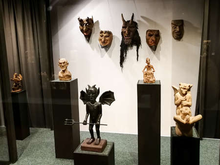 KAUNAS, LITHUANIA - APRIL 08, 2015: Symbolic devil sculpture artwork in the Zmuidzinavicius Devils Museum in Kaunas Lithuaniaのeditorial素材