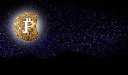 Bitcoin symbol as a golden moon in front of starry night sky. Cryptocurrency future conceptの写真素材