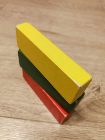 Lithuania flag constructed from 3 color wooden blocks as a toys. Patriotism conceptの写真素材