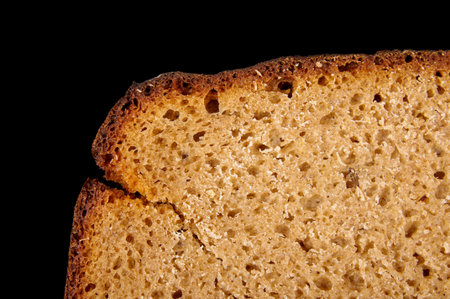Macro close up of traditional lithuanian rye bread (dark bread) slice