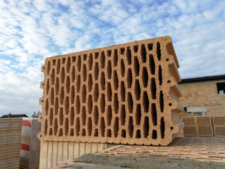 Ceramic building block for house building in the construction site close up