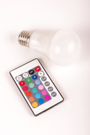Remote control for light emitting diode LED theme light bulb isolated on the white backgroundの写真素材