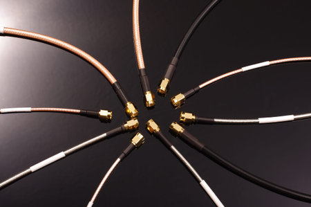 Many coaxial radio frequency cable for measurements isolated on the dark background