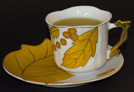 Green tea cup gildedの写真素材