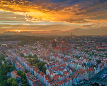 Aerial sunset view of the amazing old town of Gdansk (Poland), member of Hanseatic League with ships and yachts in the riverの写真素材
