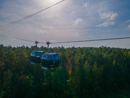 Cable car in Druskininkai from city center to snow arena over river of Nemunasの写真素材