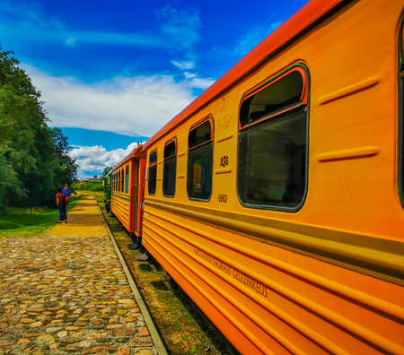 Historic Lithuanian narrow gauge railway train and station in Rubikiai, Anyksciai districtのeditorial素材