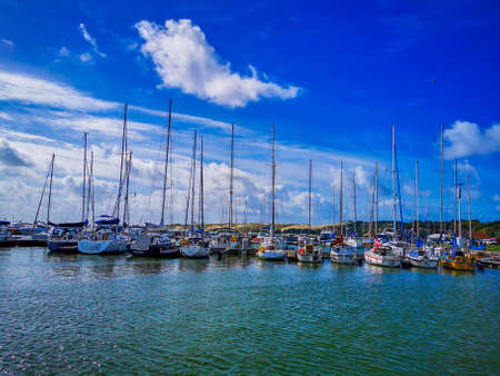 Yacht marina and blue sky and clear crystal water in Nida resort in Lithuaniaのeditorial素材