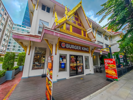 01 23 2023 - Bangkok, Thailand. Exceptional Asian style Burger king building in Bangkok, Thailand. Unique Thai style decorated fast food restaurantのeditorial素材