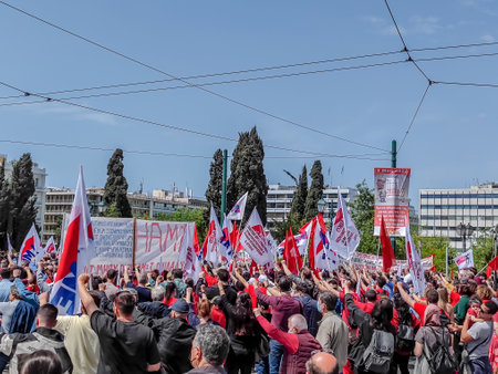 01 05 2022 - Athens, Greece. Protesters, flags, demonstrate against government on May 1st Labor Day outside the Greek Parliament in Syntagma Squareのeditorial素材
