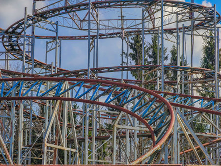 Abandoned rollercoaster in a park in middle of the city. Amusement park built during Soviet Union times in Elektrenai, Lithuaniaの写真素材