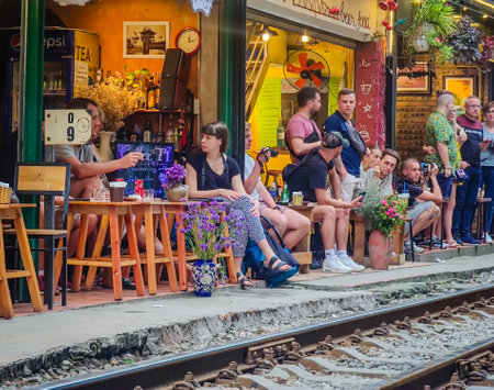 Hanoi, Vietnam - 04 30 2023: Hanoi train street in Vietnam. A narrow street of the Hanoi Old Quarter where trains passing through the houses.のeditorial素材