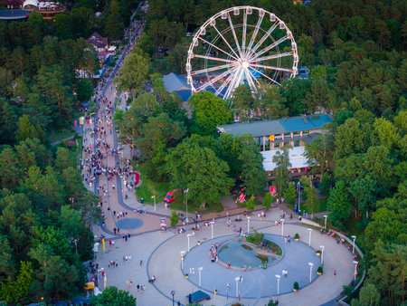 Palanga, Lithuania. Aerial drone view of Baltic sea resort city. Central square with ferris wheel