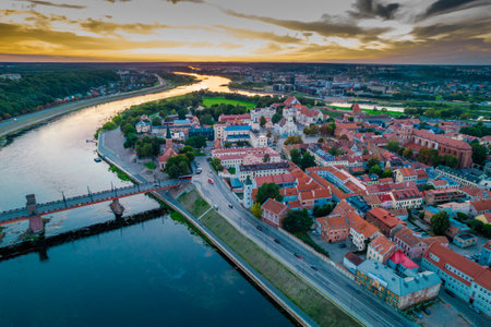 Kaunas old town, Lithuania. Aerial view of a colorful summer sunset over the city and Nemunas and Neris river confluenceの写真素材