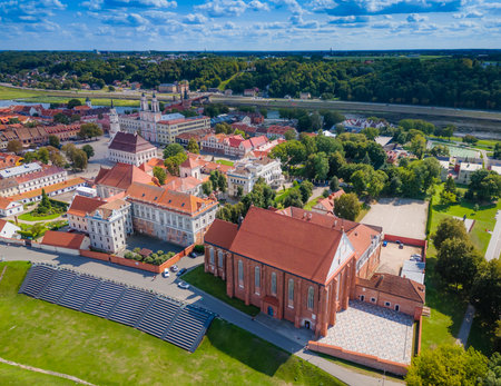 Kaunas old town, Lithuania. Panoramic drone aerial view photo of Kaunas city center with many red roof houses, churches and other historical buildingの写真素材