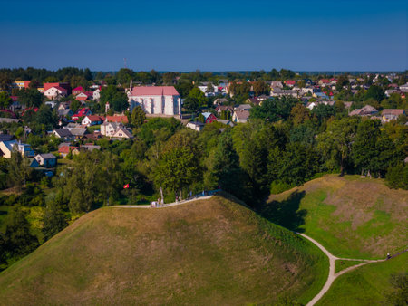 Merkine mound and town on the bank of Nemunas and Merkys river in Lithuania. Symbol of Dainava regionの写真素材