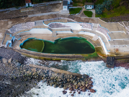 Piscina Natural Da Boca De Ribeira, Nordeste, Sao Miguel, Azores. Aerial drone view of natural swimming pool in Atlantic Ocean, Azores islandsの写真素材