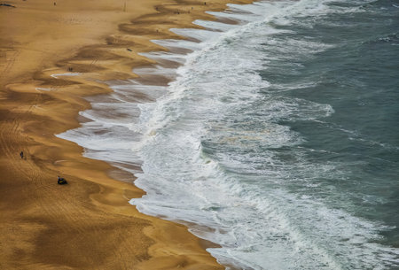 Aerial view of Nazare beach, Portugal. Panoramic landscape of Nazare city