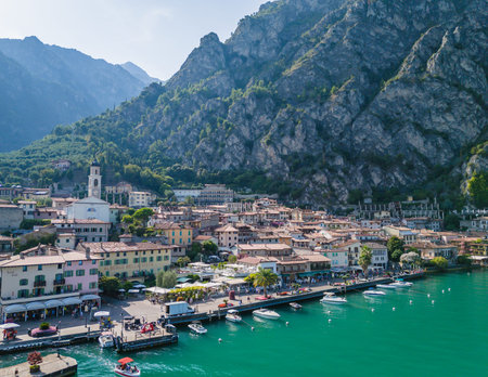 Limone sul Garda old town. Aerial view of panoramic Garda lake and Italian Alps mountains. Lombardy drone landscape of downtownの写真素材