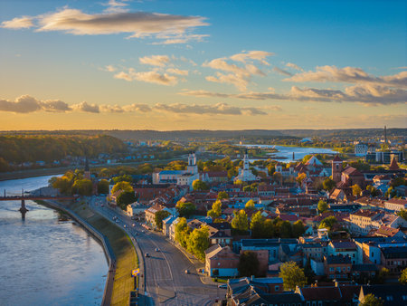 Kaunas old town and modern new city center in autumn, Lithuania. Aerial drone view on golden hourの写真素材